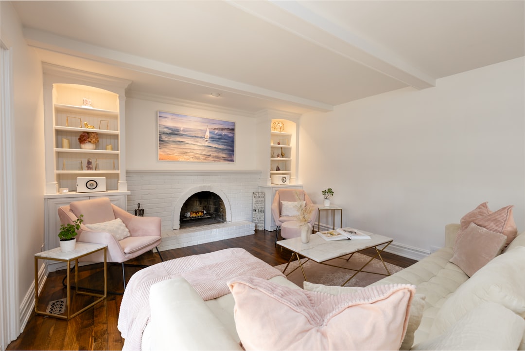 The bright, airy, and immaculately clean living room of a modern vacation rental, showcasing professional standards, safety, and property readiness for guests.