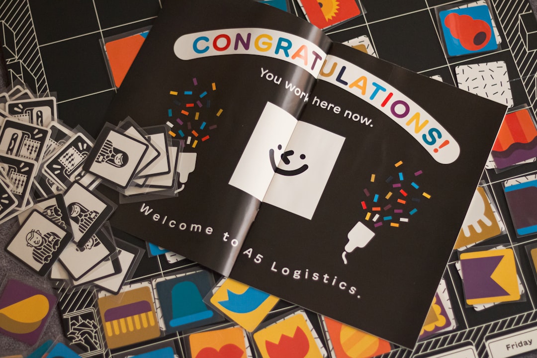 A close-up of an elegant, minimalist welcome card featuring a QR code, placed on a clean wooden table in a modern home entryway.